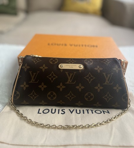 Louis vuitton eva pochette bag - louis,